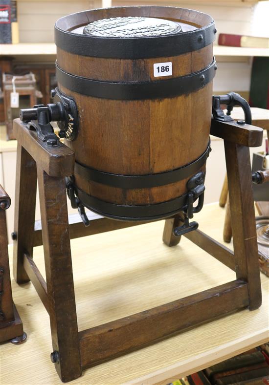 An Antique butter churn on stand, marked Shakespearian Hathaway Maker, Chippenham,